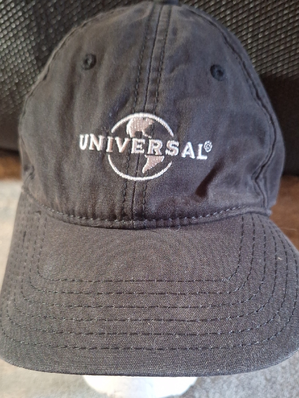 Universal Black Baseball Hat with White Embroidered Globe Logo